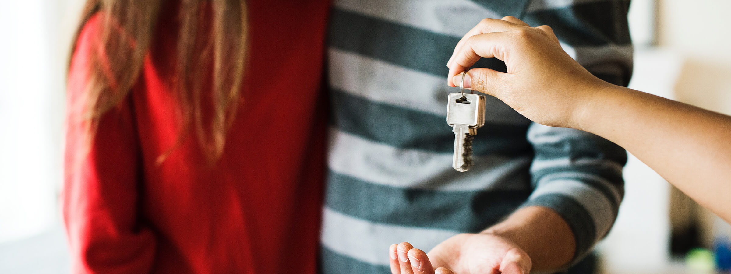Badu-Capital-For-House-And-Land-Purchasers-Couple-Being-Handed-Keys